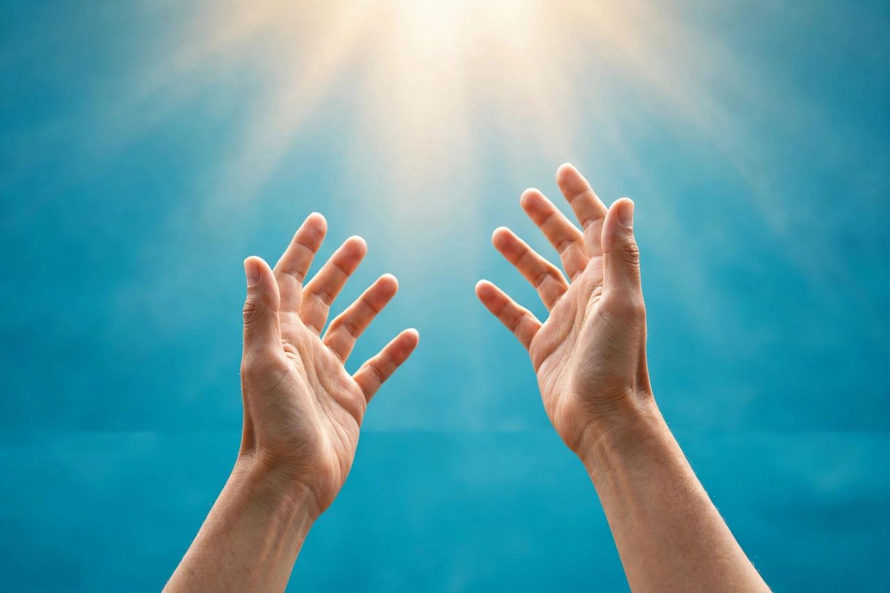 Hands reaching upward toward the light